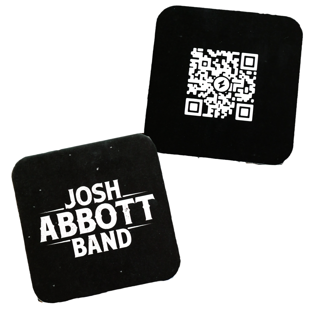 Two square coasters, one with a QR code and the other with ’JOSH ABBOTT BAND’ text.